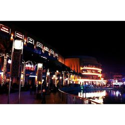 View of illuminated city at night