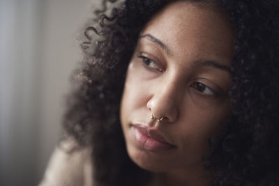 Close-up of pensive young woman