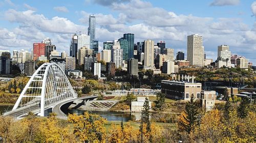 Modern buildings in city against sky