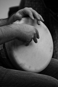 Close-up of man playing a percussion instrument