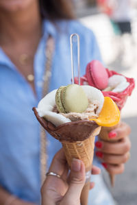 Hand holding ice cream cone