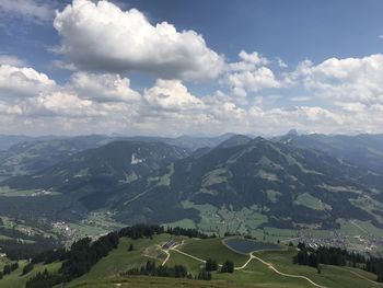 Scenic view of landscape and mountains against sky