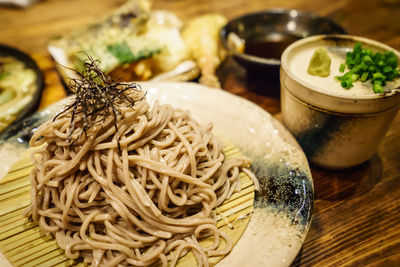 Close-up of noodles in bowl on table