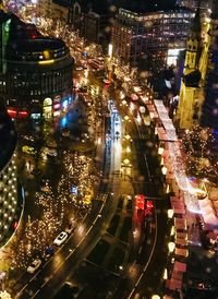 High angle view of illuminated cityscape at night