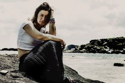 High angle view of woman standing on beach