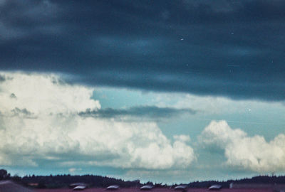 Scenic view of dramatic sky over land
