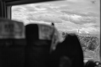 Close-up of woman against sky