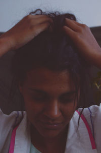 Close-up portrait of man wearing eyeglasses
