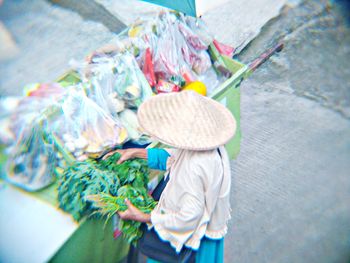 Rear view of woman wearing hat