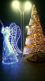 Close-up of illuminated christmas tree at night