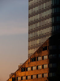 Low angle view of modern building against sky