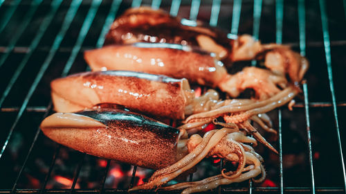 Close-up of meat on barbecue grill