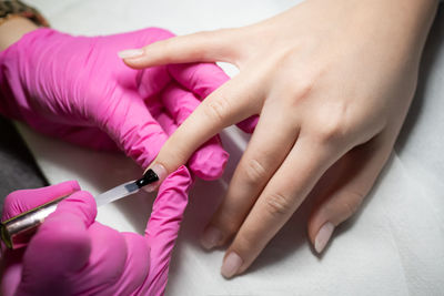 High angle view of woman holding hands