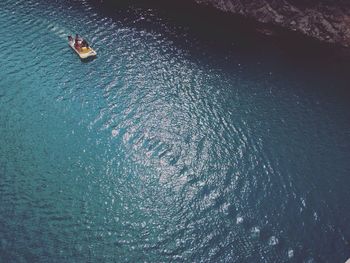 High angle view of man on boat in lake