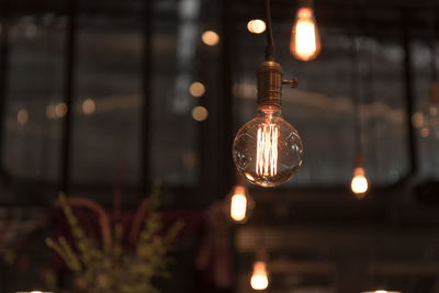 Close-up of illuminated light bulb