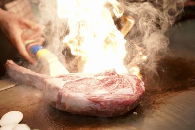 Close-up of person preparing food