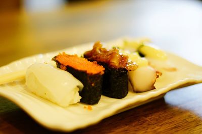 Close-up of sushi served in plate