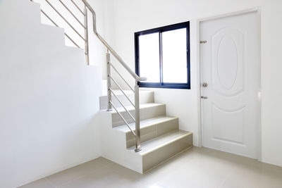 Directly below shot of spiral staircase of building