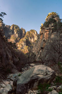 Low angle view of rock formations