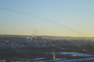 Cityscape against clear sky