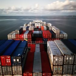 View of commercial dock against cloudy sky