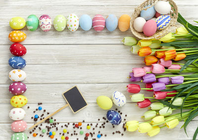 Close-up of multi colored flowers and eggs