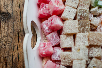 Close-up of colorful dessert in tray on table