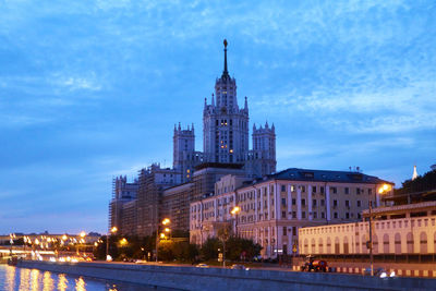 Buildings in city at night