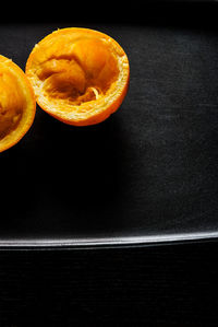 Close-up of orange fruit on table