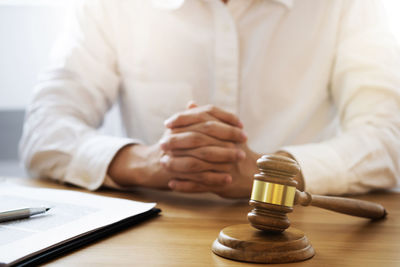 Close-up of a man holding a table