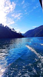 Scenic view of sea against blue sky