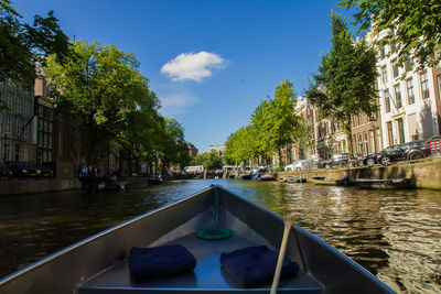 Panoramic view of people in city against sky