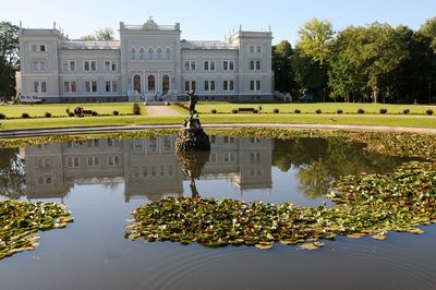 Reflection of built structure in pond