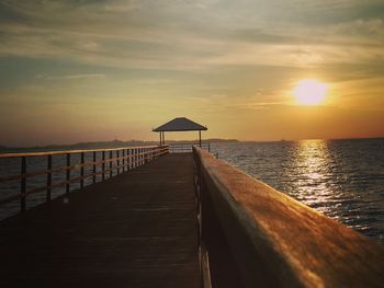 Scenic view of calm sea at sunset