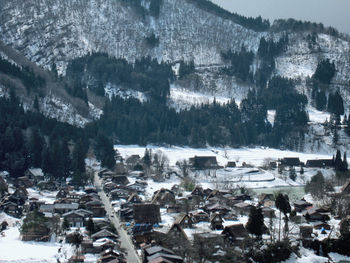 Aerial view of landscape against sky during winter