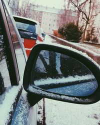 Close-up of car on side-view mirror