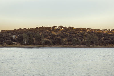 Scenic view of lake against clear sky