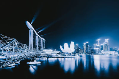 Illuminated buildings in city at night