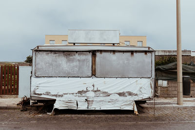 Old motor home against sky