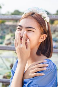 Portrait of beautiful woman with eyes closed