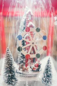 Close-up of christmas decoration on glass