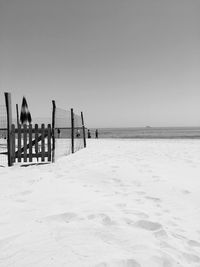 Scenic view of beach against clear sky