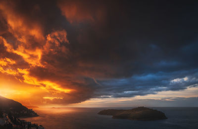 Scenic view of sea against sky during sunset