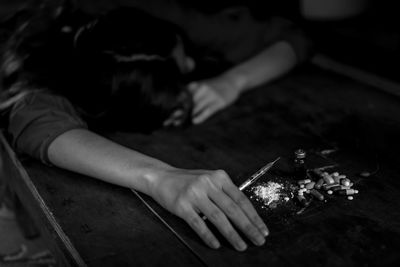 High angle view of woman working on table