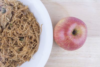 High angle view of apples in bowl on table