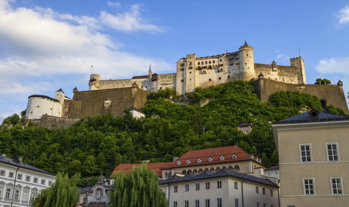 Famous hohensalzburg fortress on a hill in salzburg by day, austria