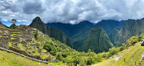 Panoramic view of green landscape against sky