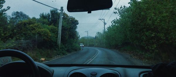 Road seen through car windshield