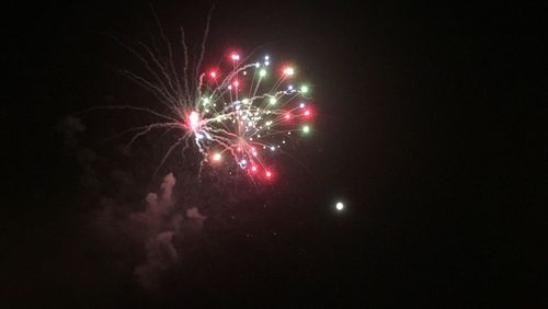 Firework display at night