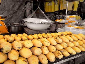 Various fruits for sale at market stall